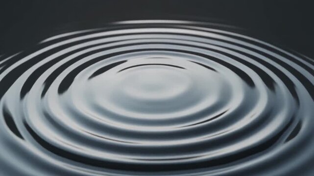 Liquid ripple effect, water drop impacting surface, concentric circles spreading