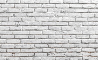 Obraz premium Textured white painted brick wall, evenly spaced and stacked