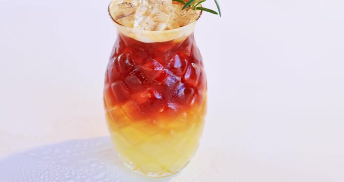Pineapple-shaped glass bottle containing pineapple juice coffee specialty drinks