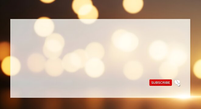 A glowing white rectangle with a red button on a blurred background of golden lights.