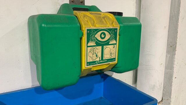 Selangor, Malaysia April 23th 2026- Wall mounted emergency eyewash station positioned above a blue basin within an industrial workspace