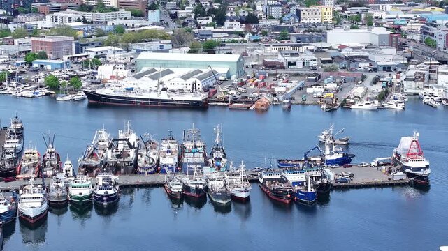 Aerial of Fishing vessel leaving Fishermans Terminal with Ballard #009