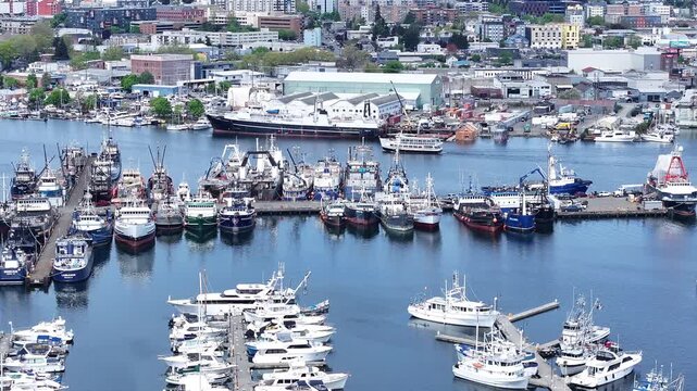 Aerial View of Fishermans Terminal fishing boats with Ballard behind