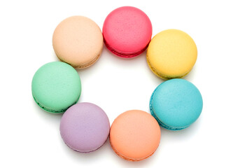 Fototapeta premium Colorful macarons arranged in a circle on a clean surface