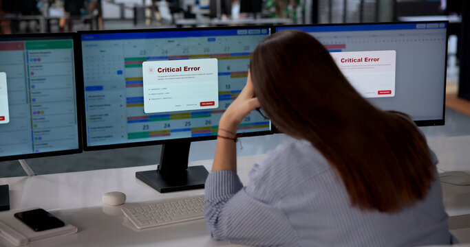 Young Woman Frustrated By Critical Error Message