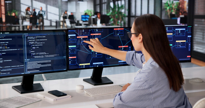 Woman Uses Visual Software, Building Node-based Solutions