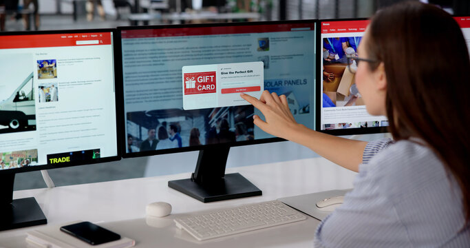 Woman Frustrated Using Computer As Endless Popup Ads Interrupt News Reading