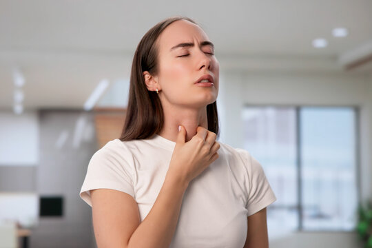Young Woman Feels Neck Pain