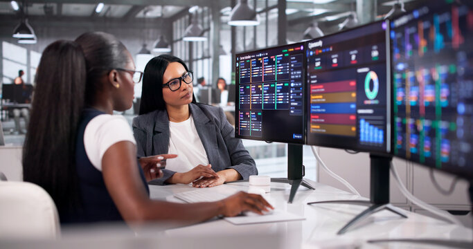 Cybersecurity Specialists Monitor Network Data