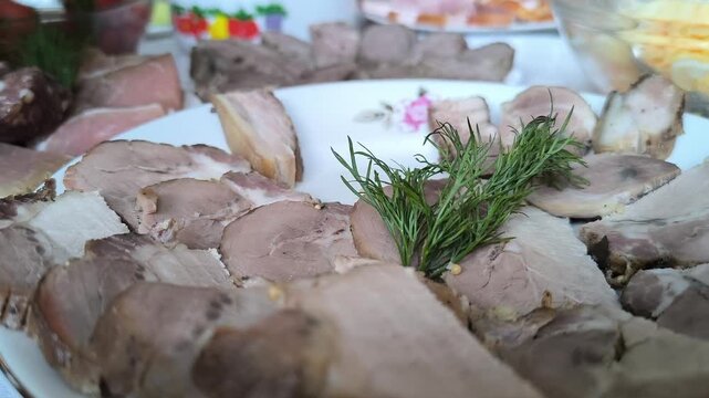 Boiled meat on a plate on the table. Meat for eating.