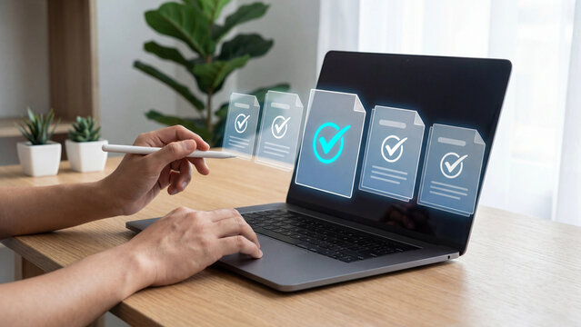 Business Professional Approving Multiple Digital Documents on Laptop with Stylus for Paperless Workflow and Compliance Verification
