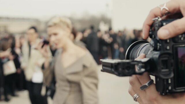 Photographer shooting celebrity on the red carpet