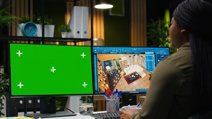 Isolated mockup and CAD software used by black female graphic designer to create a modern layout, 3D modeling program and chroma key on dual monitors. Architectural design assets. Camera B. © DC Studio