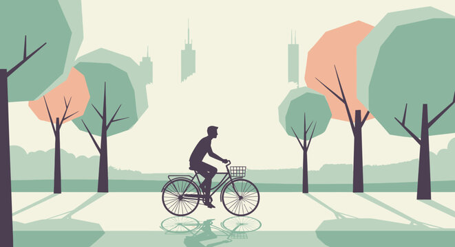 Man riding bicycle in city park with trees silhouette