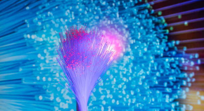  Fiber optics network cable on technology background