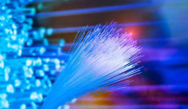  Fiber optics network cable on technology background