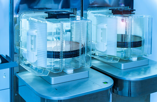 Silicon Wafer Under Cleanroom Fabrication in plastic holder box,integrated circuits to manufacture CPU and GPU