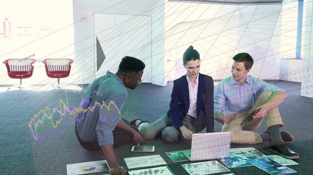 Business team sitting spreading charts and placing laptop, causing animated graphs for data review