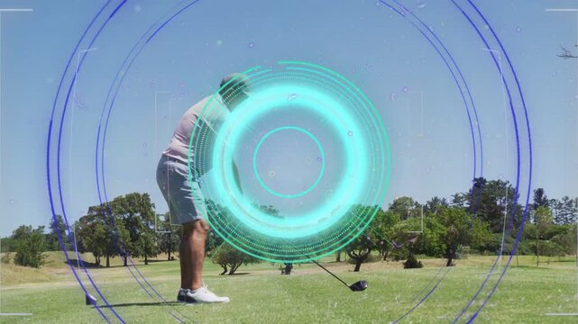 Male golfer starting backswing after hold at golf tee, driving ball with HUD overlay guiding launch