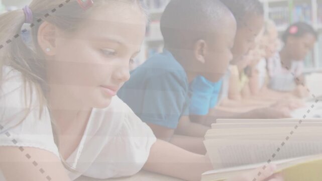 Girl on stomach reading open book as camera panning across table and bookshelves for education