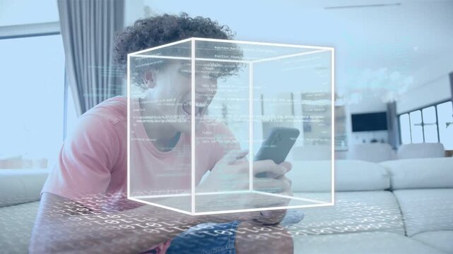 Man on sofa with phone tapping, viewing data, causing 3D cube over hands, showing tech code