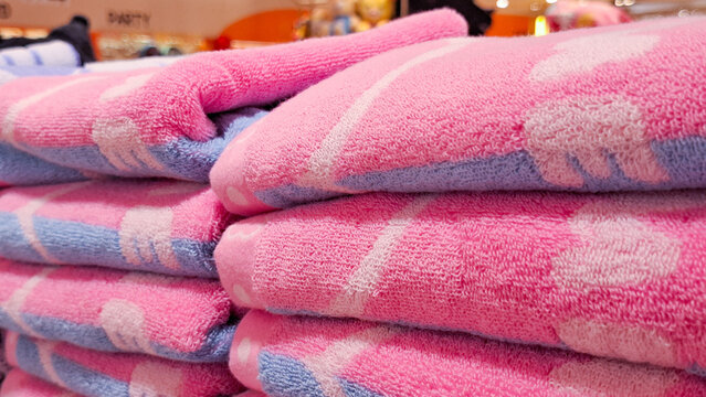Stack of soft fluffy Sanrio character patterned cotton towels for cute home textile decor and collector merchandise on April 27, 2026 in Bagnkok, Thailand 