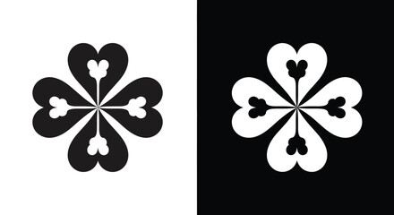 A striking black and white image depicting a symmetrical stylized four leaf clover design © grvect02