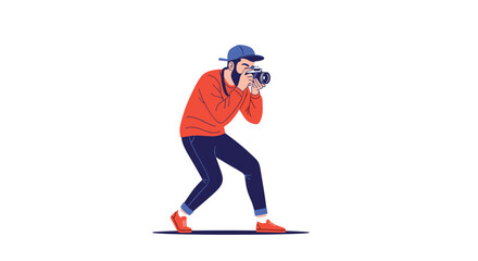 Fototapeta premium Professional photographer wearing a red sweater and blue cap aiming his camera to take a creative photo in studio.