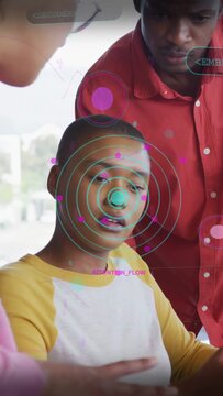 Vertical video: Left peer pointing, woman turning smiling, rings and labels guiding tech attention