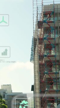 Vertical video: On load AR icons fading and shifting over scaffold facade, showing repair progress