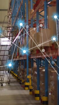 Vertical video: Net rising left causing ladder entering aisle by racks lighting nodes guiding picks