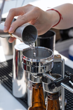 Bartender Pouring Liquid from Jigger into Strainer Close-up Bar Tools