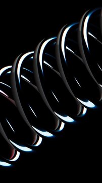 Chrome metal spring coil reflecting vibrant neon lights against a deep black background with a focus on mechanical industrial texture