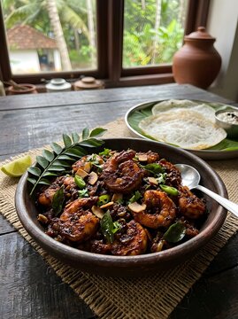 Spicy kerala style prawn roast with appam