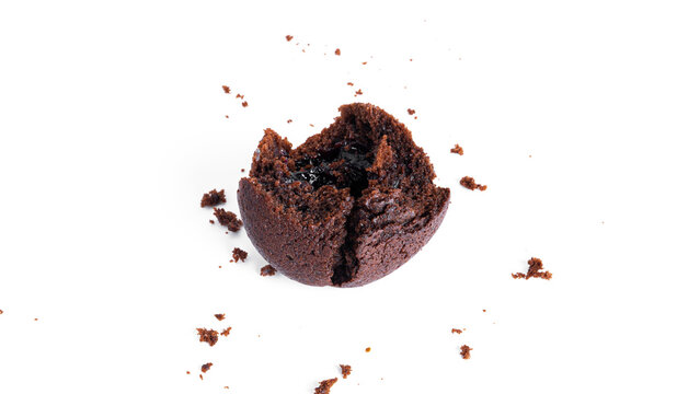 Chocolate cupcakes with cherry jam isolated on a white background. Chocolate muffin.