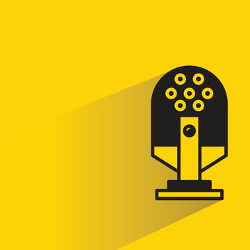 mic icon with drop shadow on yellow background