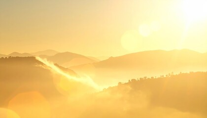 Fototapeta premium Golden sunrise over misty hills, soft light flooding landscape, creating a serene and warm atmosphere