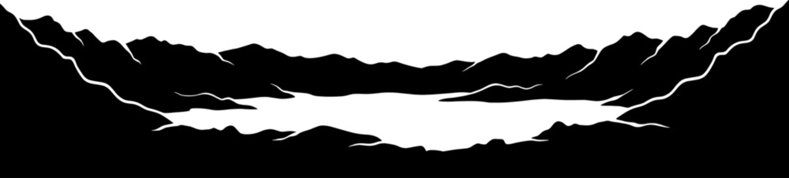 Wide volcanic caldera lake surrounded by mountains silhouette