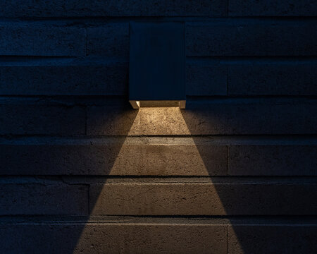 Modern Outdoor Wall Light on Stone Wall at Night