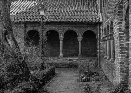 public garden with remains of an old monastery in black and white
