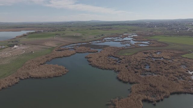 Cinematic Documentary-Style Drone Flight Toward Agricultural Fields and Farmland Near Mogan Lake in Ankara, Turkey