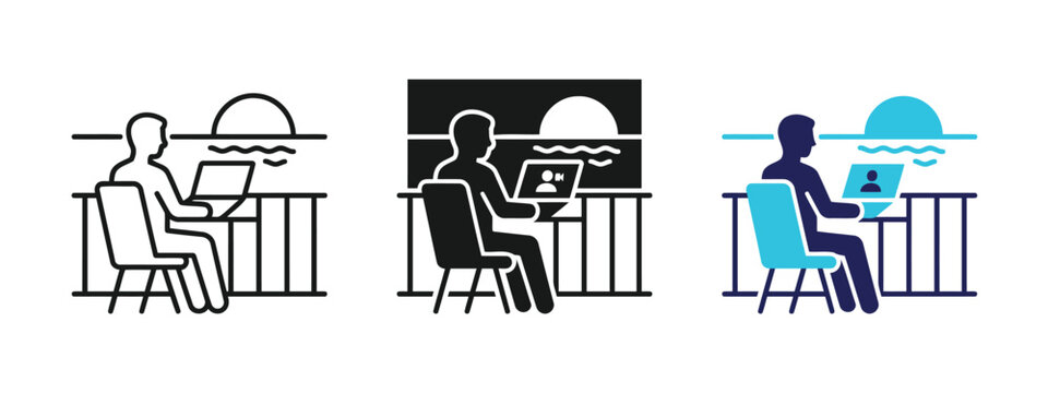 Digital nomad working remotely on a laptop while enjoying a scenic sunset view from a balcony