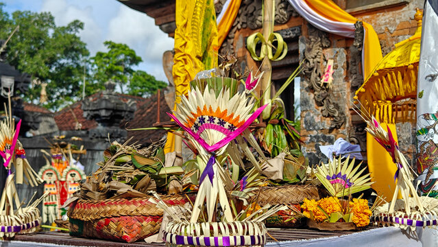 Traditional Balinese Hindu Offerings and Ceremonial Decorations at a Village Temple