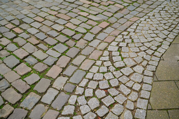 Fototapeta premium Cobblestone path through city history