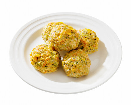 baked meat and vegetable polpette on plate