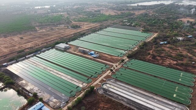 Microalgae Cultivation in Open Ponds, Aerial View of Algae Production Facility for Biofuel and Biotechnology