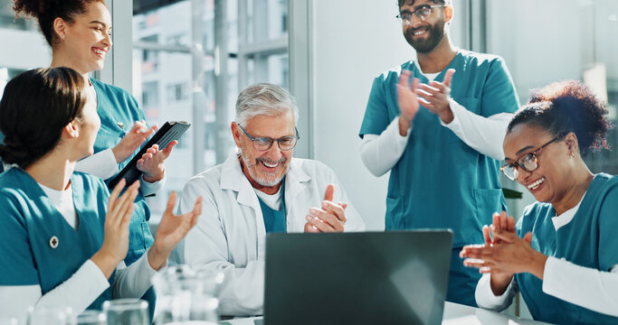 Applause, man and doctor team with laptop in clinic, congratulations and medical journal success. Publishing approval, support and happy people clapping for healthcare achievement, pc and celebrate