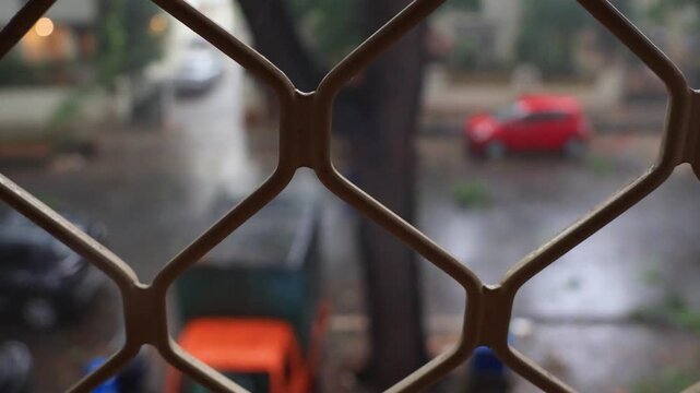 Bangalore, India, 18th April 2026: Severe Monsoon Rainstorm with Hailstorm and Strong Winds Blowing Across Urban Streets &ndash; Cloudy Sky Over Indian City Skyline During Heavy Rainy Weather