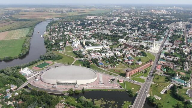 Drone flying backward over Kolomna city panorama