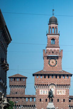 Filarete Tower of the Sforza Castle in Milan and the equestrian monument of Giuseppe Garibaldi in the foreground. Italy